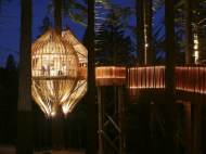 Yellow Treehouse Restaurant during night with an image of the walkway
