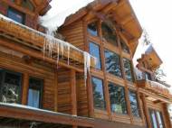 LEED Certified Log Home, Custom Design during the winter at Government Camp, Oregon