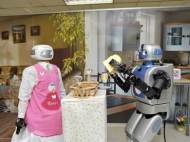 Mahru-Z (right) helps Mahru-M (left) to prepare and serve the breakfast