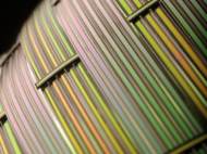 The Fink lab has demonstrated that it can manufacture acoustic fibers with flat surfaces, like those shown here, as well as fibers with circular cross sections