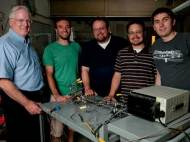 Professor Brian Cantwell, graduate student Yaniv Scherson, Professor Craig Criddle, and graduate students George Wells and Koshlan Mayer-Blackwell in the Criddle lab with the nitrous oxide decomposition cell.
