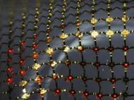 Stretchable micro-LED display, consisting of an interconnected mesh of printed micro LEDs bonded to a rubber substrate